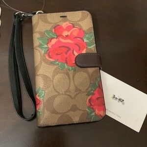Coach iPhone XR wallet case with strap never used please see photos for details